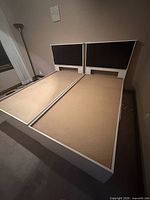 overall view of assembled king platform bed with split bases and headboards