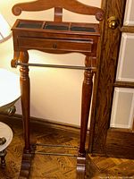 Full view of valet stand showing drawer, compartments, legs