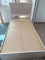 Full view of twin storage platform bed frame with headboard