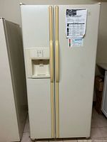 Front view showing full exterior, handles, and dispenser