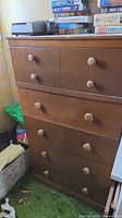 Front view showing full dresser and drawer configuration