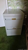 Front view of beige/grey Cole 2-drawer metal cabinet