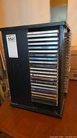Front view of rack loaded with CDs