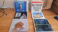 Stack of LPs showing Roger Whittaker, The Tender Trap soundtrack, Ray Conniff Invisible Tears, Exodus soundtrack, Andre Kostelanetz and others