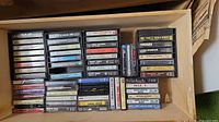 Drawer containing over 30 cassettes in cases