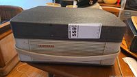 Closed Philips EL 3547A unit with black lid and front badge