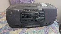 Front view of Sharp boombox showing CD changer label, control panel, dual cassette decks