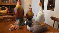 overview of all five figurines on table