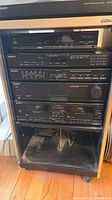 Full stack showing receiver, equalizer, tuner, CD player, cassette deck