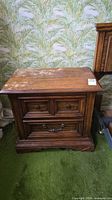 Front view of nightstand showing two drawers and overall design