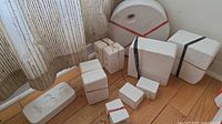 group of assorted plaster molds on floor