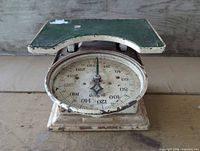 Front view of Detecto kitchen scale showing dial and platform