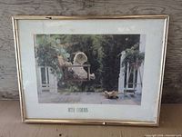 Full view of framed Betsy Cameron print showing entire frame, mat, image and visible wear