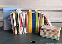 Group shot of entire assortment of books standing and stacked