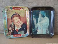 Both Coca-Cola trays front view