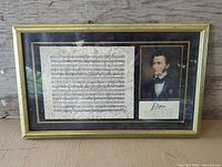 Full view of framed Chopin manuscript and portrait print