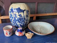 Group shot of all five porcelain and ceramic items