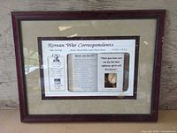 Full view of framed print showing frame, mat and printed content