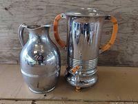 Coffee urn and pitcher side by side showing overall appearance