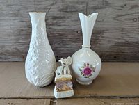 Group shot of two vases and elephant trinket box