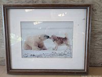 Full view of framed polar bear and husky limited edition print
