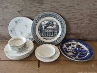 Group shot showing all mixed plates and saucers