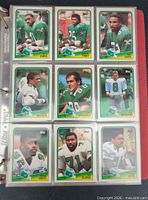 Binder page with nine Topps cards of Philadelphia Eagles players