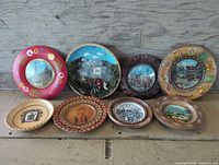 All eight decorative plates front view