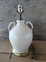 Full view of vintage ceramic jug-form lamp showing overall design and size