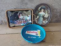 All three advertising trays displayed together