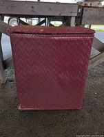 Front view of burgundy vinyl wicker hamper