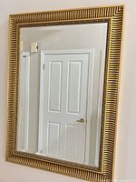 Full view of rectangular mirror on wall
