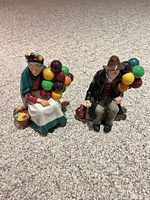 Both figurines side by side