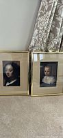 Both framed prints side by side showing overall size, frames, and mats