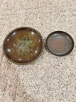 Top view of both bowls showing patina and size difference