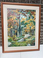 Full view of framed oil painting