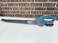 Full view of Yardworks cordless leaf blower with nozzle attached