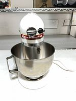 Front view of KitchenAid mixer with bowl attached