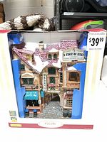 Front of boxed Lemax facade showing item and price sticker