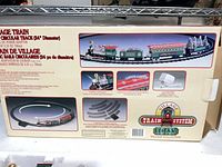 Back of Lemax Village Train Set box showing contents and 24-inch track layout