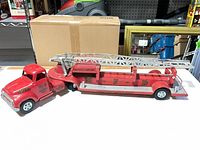 Full view of Tonka red ladder fire truck