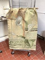 front view of tapestry hung on rod