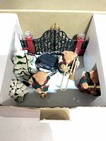 Contents in box: three bear figures with instruments, tree, gate, adapter