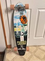 Full view of longboard front, wheels, trucks, graphics