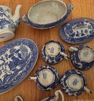 Undersides of cups showing Occupied Japan stamp plus other pieces