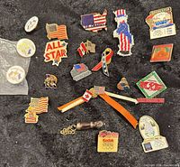 All pins laid out on black background