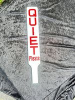Full view of two-sided wooden “Quiet Please” sign