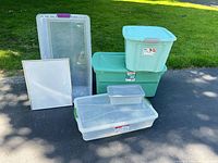 Group view of all bins and whiteboard on driveway