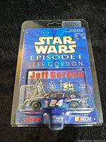 Front view of sealed Star Wars Episode I Jeff Gordon die-cast car on card