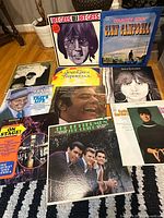 Group shot showing all 11 album covers